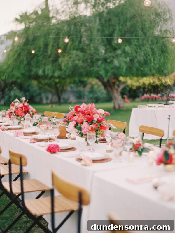 A table with flowers and chairs
