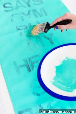 Someone painting something aqua