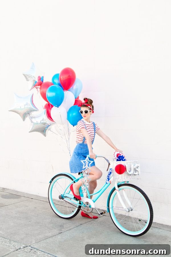 4th of July Balloon Bike DIY Decoration Ideas 2 A woman riding a bicycle with colorful balloons
