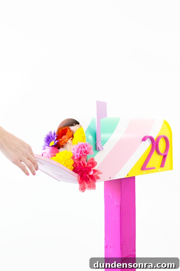 A mailbox with flowers in it