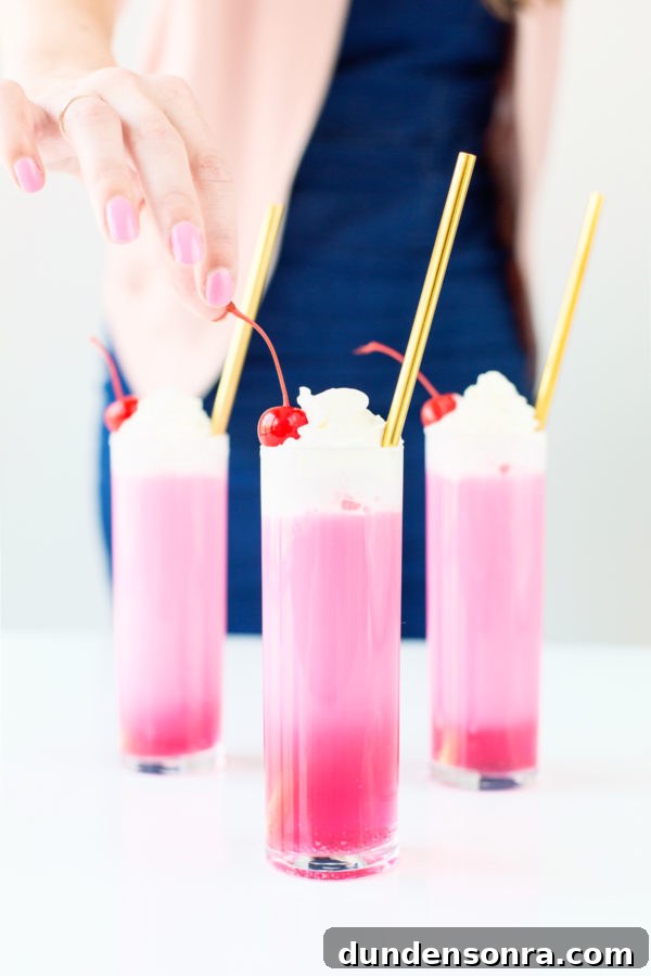 Neon Italian Cream Soda Recipes for Vibrant, Creamy Drinks 8 Three glasses with gold straws and pink liquid
