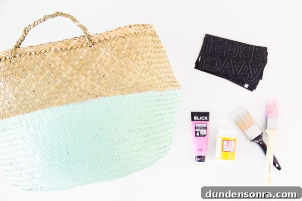 DIY Painted Graphic Laundry Baskets: Step-by-Step Guide for Stylish Storage 4 A basket and craft materials