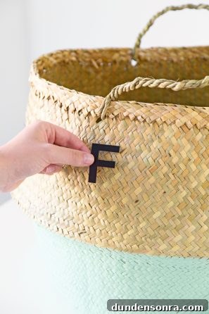 DIY Painted Graphic Laundry Baskets: Step-by-Step Guide for Stylish Storage 6 Laundry basket with "F" on it