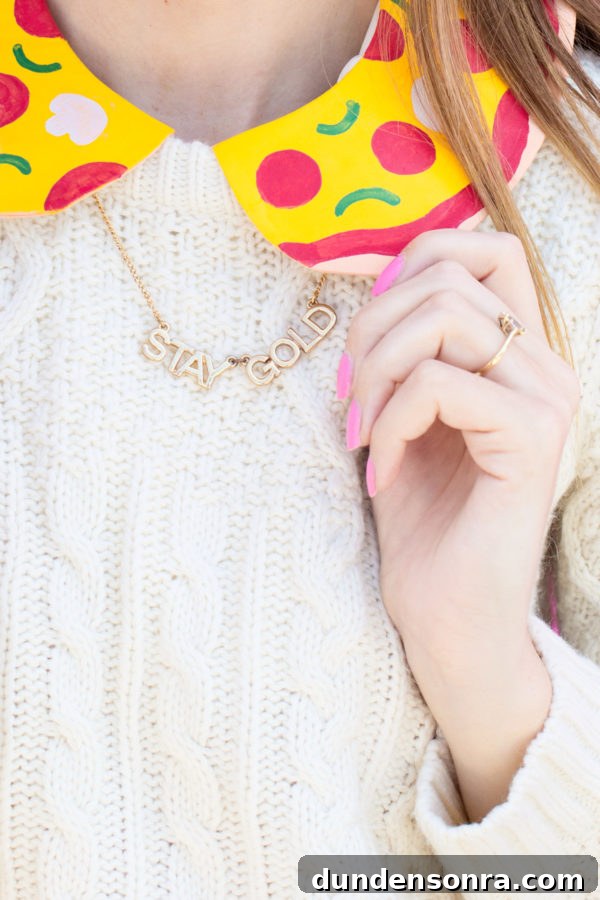 How to Make a Pizza Collarette at Home: Step-by-Step Guide 12 Someone wearing a necklace that says "stay gold"
