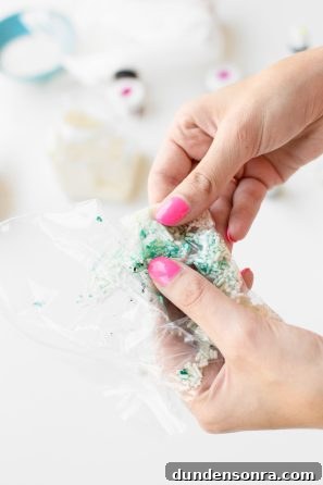 Someone holding a bag with sprinkles 