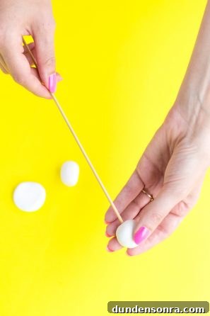 DIY Fruit Drink Markers: Quick Craft Ideas for Parties 7 Someone poking a dough ball