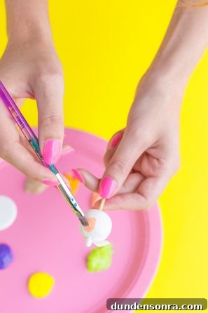 DIY Fruit Drink Markers: Quick Craft Ideas for Parties 9 Someone painting clay