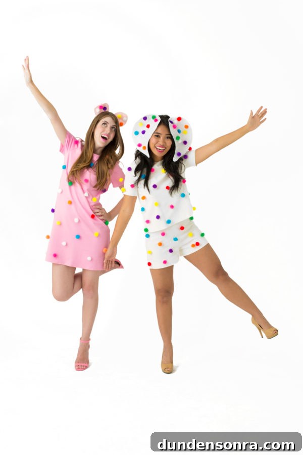 Two girls dressed as frosted animal cookies