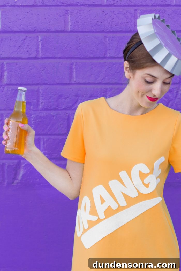 A woman in an orange soda costume