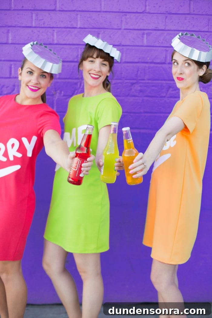 Three woman in soda bottle costumes