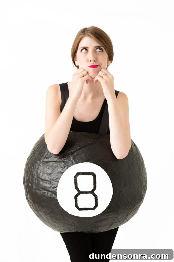 A person wearing an eight ball costume 