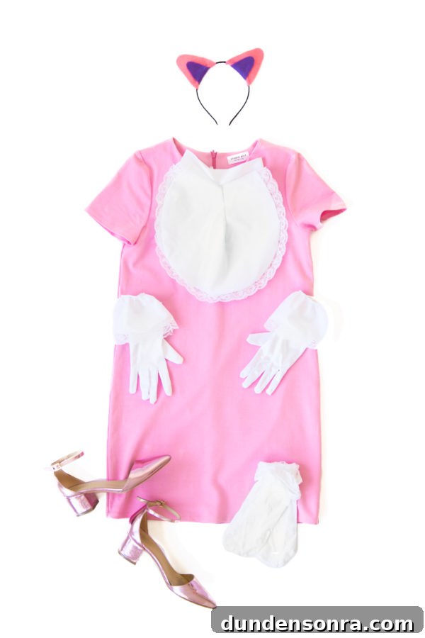 A pink dress with white gloves and beige heels 
