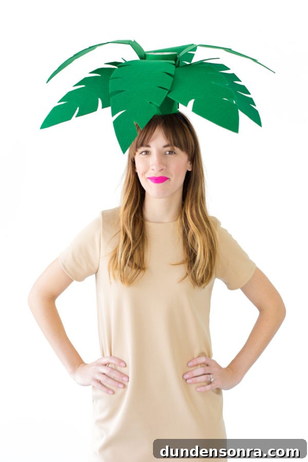 DIY Palm Tree and Beach Ball Halloween Costume Ideas 15 A woman dressed as a palm tree