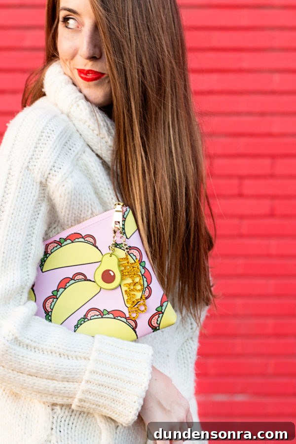 Introducing... Can't Clutch This! Ultimate Guide to Clutch Problems 6 A woman wearing a white sweater and holding a taco clutch