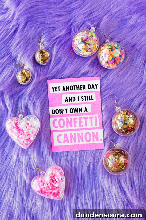 A pink paper and confetti earrings