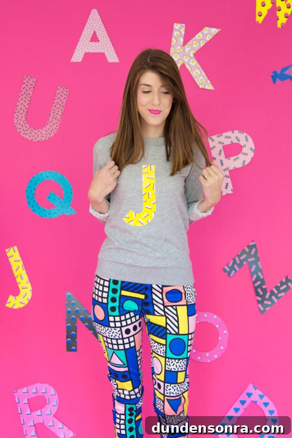 Custom Monogram Sweatshirts: DIY Graphic Initial Design Guide 2 A girl posing for a picture