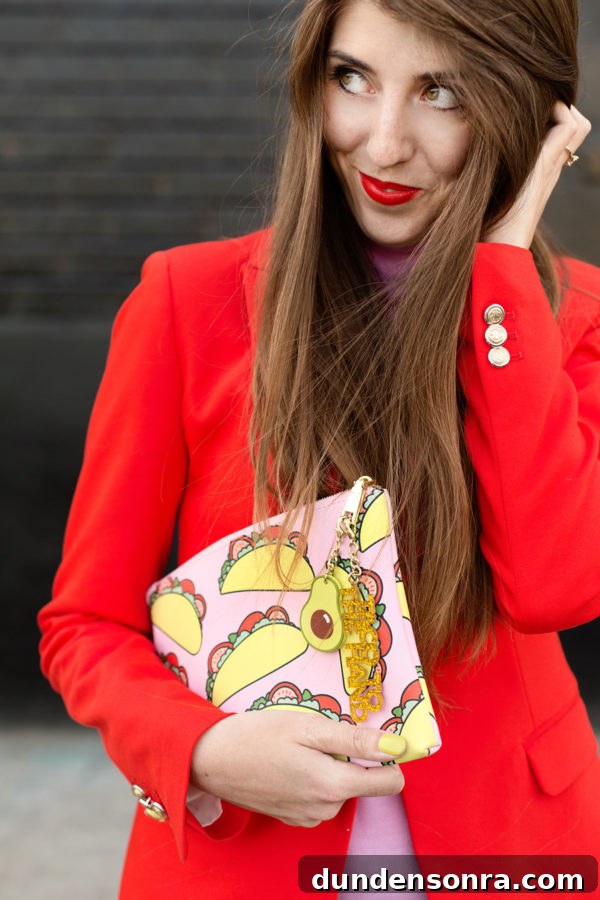 What's in My Clutch? New Series + Big Giveaway Inside 4 A woman holding a taco clutch