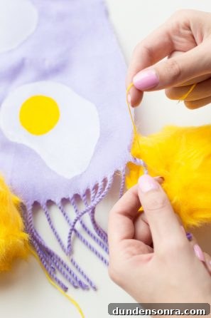Purple fabric with egg on it