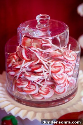 strawberry-birthday-party-red-and-white-lollipops