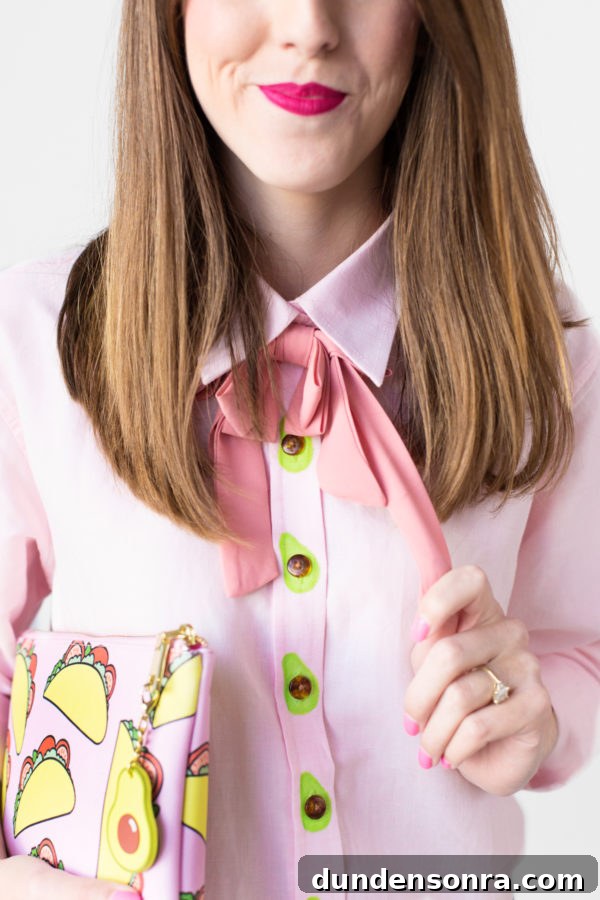 DIY Avocado Buttons: How to Make Stylish Avocado Jewelry at Home 4 A woman wearing a pink shirt and bow