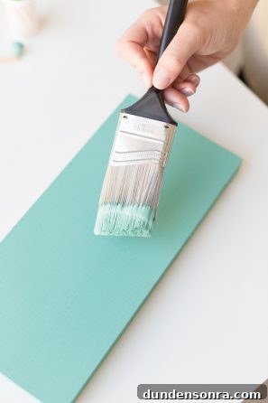 Creative Pegboard DIY Ideas for Stylish Home Organization 14 Paint brush and turquoise board