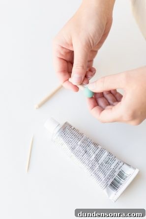 Creative Pegboard DIY Ideas for Stylish Home Organization 16 Tube and sticks