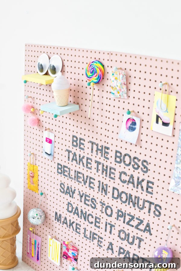 Creative Pegboard DIY Ideas for Stylish Home Organization 18 A pink wooden board with accessories on it