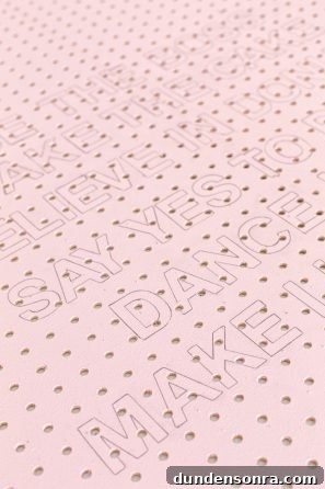 Creative Pegboard DIY Ideas for Stylish Home Organization 10 A pink wooden board with holes