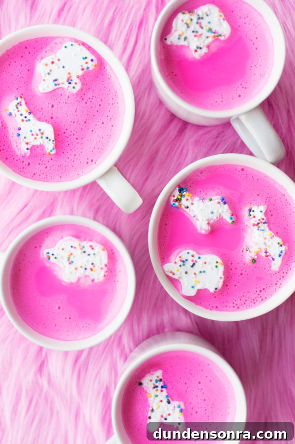 Mugs with pink liquid in it