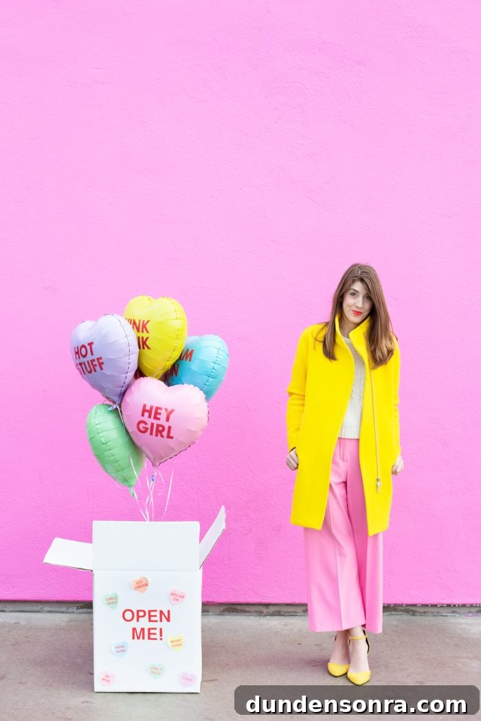 Valentine’s Balloon Surprise Box DIY: Romantic Gift Tutorial 3 A woman standing next to a box of balloons