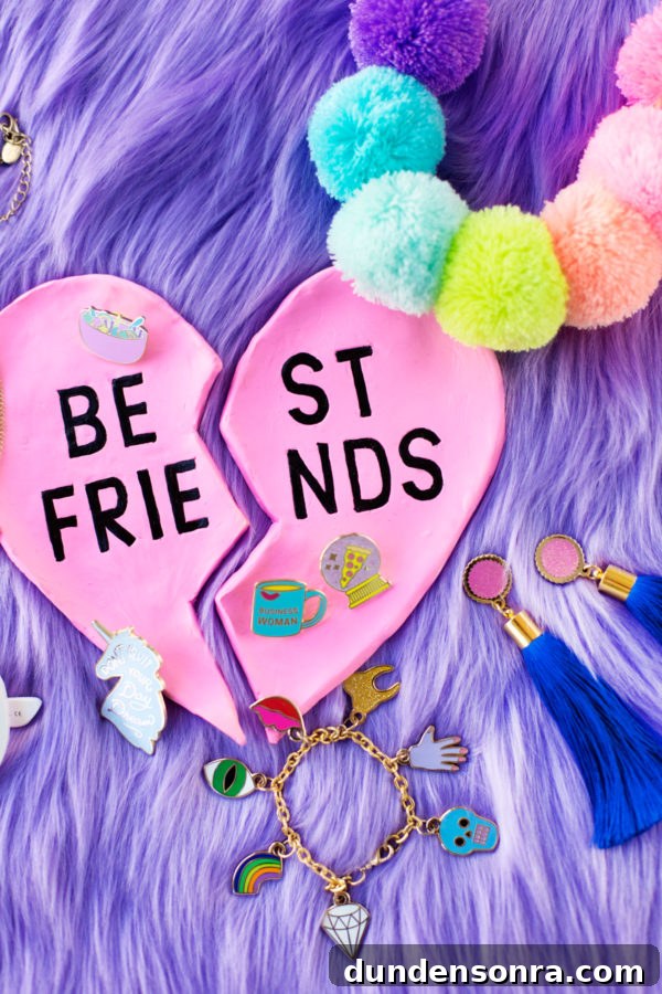 A pink ring dish that says best friends