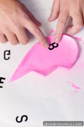 Pink heart dish with letters