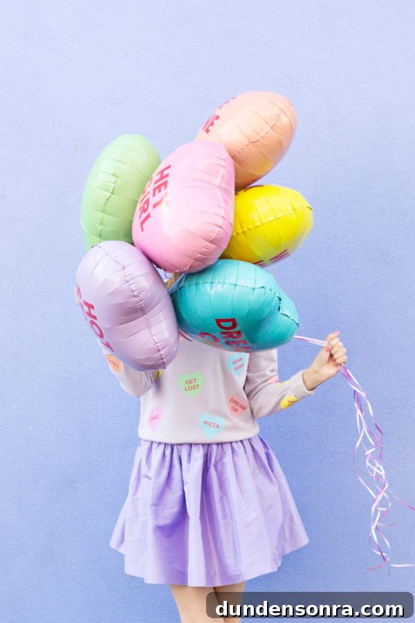 A woman holding balloons
