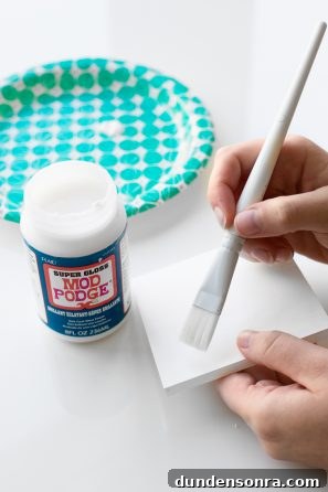 DIY Pom-Pom Storage Boxes: Stylish Craft Organization Ideas 6 Paint brush and white square