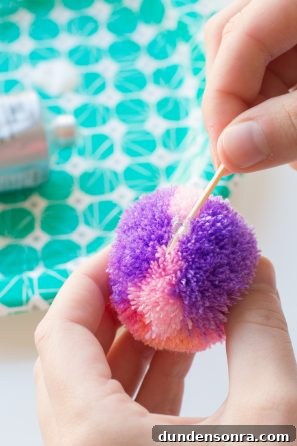DIY Pom-Pom Storage Boxes: Stylish Craft Organization Ideas 7 Purple and pink pom pom