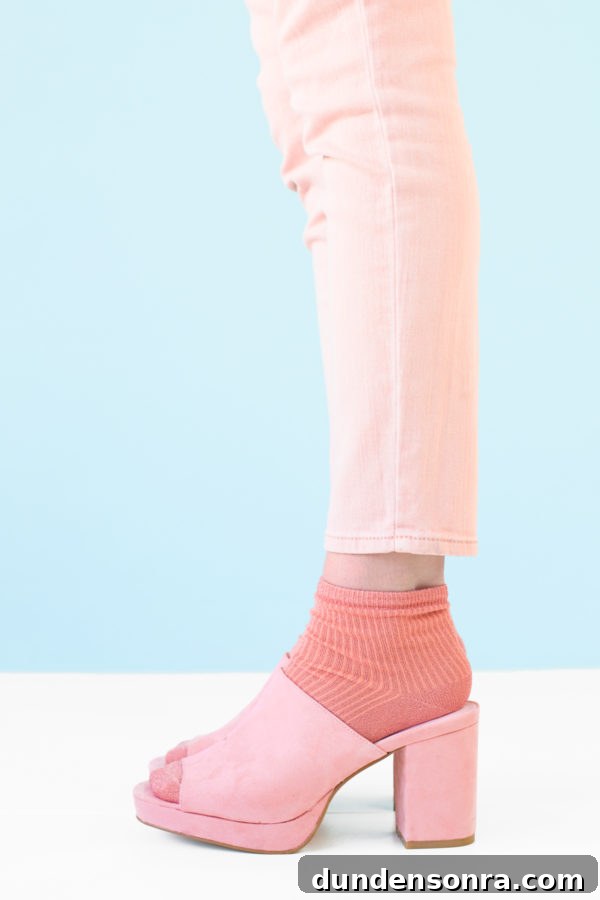 Pink jeans, pink socks, and pink shoes