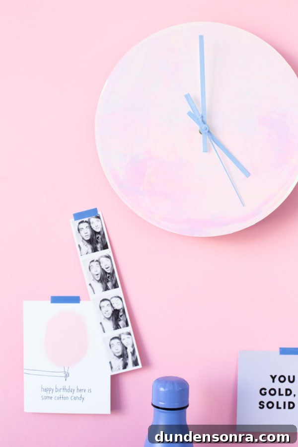 A pink clock and photobooth images
