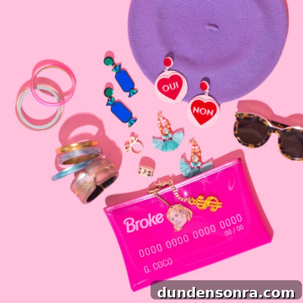 Pink clutch, earrings, and sunglasses