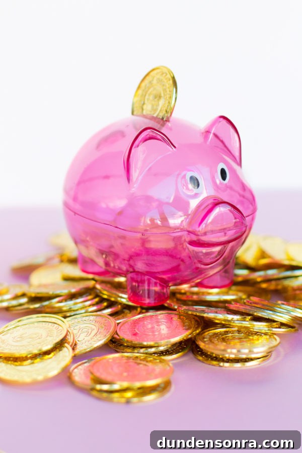 A Week of My Spending: Where Every Dollar Went 3 A pink piggy bank and fake gold coins