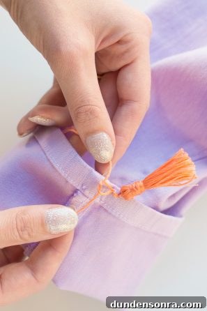 Purple jeans and orange thread