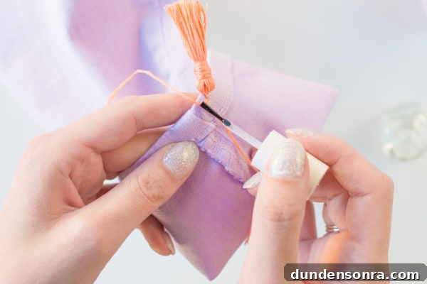 DIY Tassel Jeans: How to Add Trendy Tassel Trim to Your Denim 16 Purple jeans and orange thread