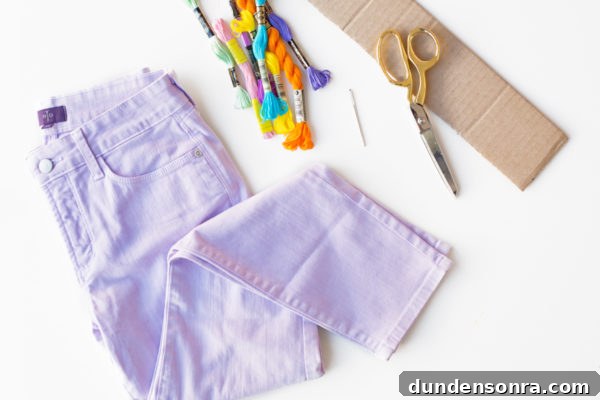 DIY Tassel Jeans: How to Add Trendy Tassel Trim to Your Denim 5 Purple jeans and scissors