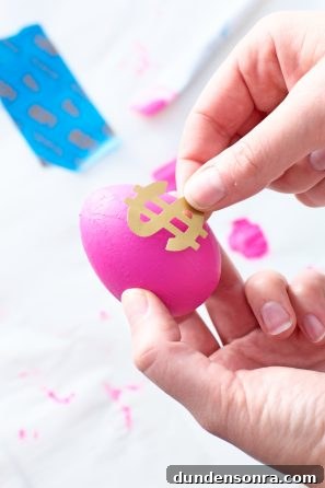 DIY Money Bag Easter Eggs: Creative Ways to Gift Cash This Easter 6 Pink egg with gold money sign
