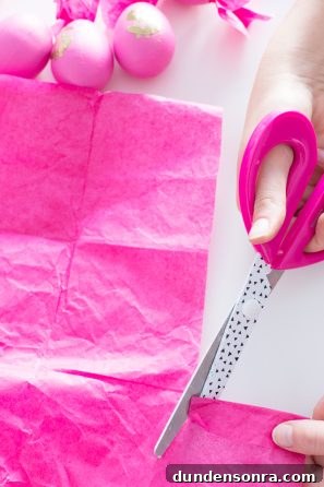 DIY Money Bag Easter Eggs: Creative Ways to Gift Cash This Easter 7 Pink paper and pink scissors