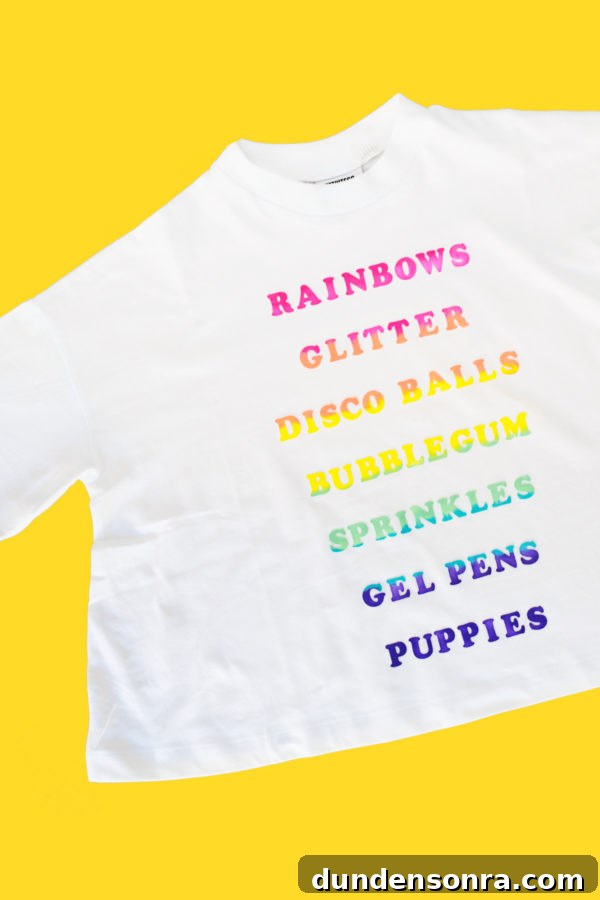 A white shirt with rainbow words