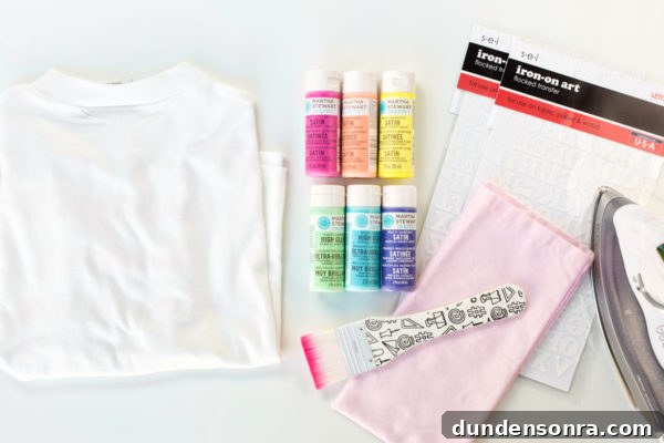 Paint, paintbrush, and white shirt