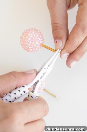 Someone making an earring