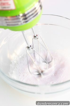 How to Make a Birthday Cake Soap That Smells Like Cake 16 Someone whisking a substance in a bowl