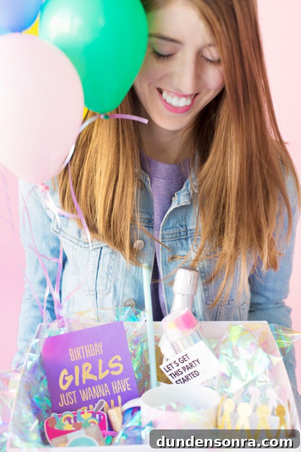 Someone holding a birthday box