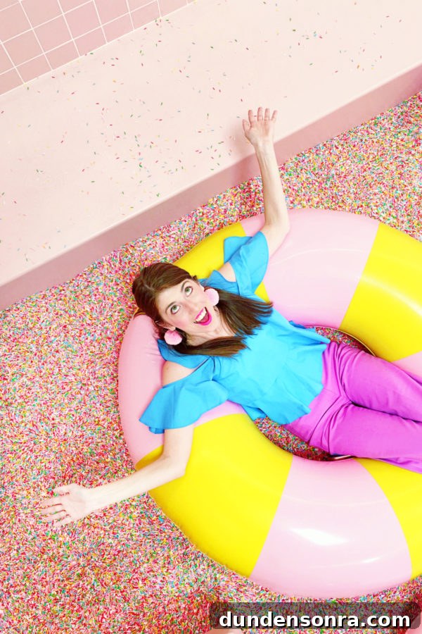 Inside the Museum of Ice Cream Los Angeles: What to See and Do 3 A pool full of sprinkles and a girl